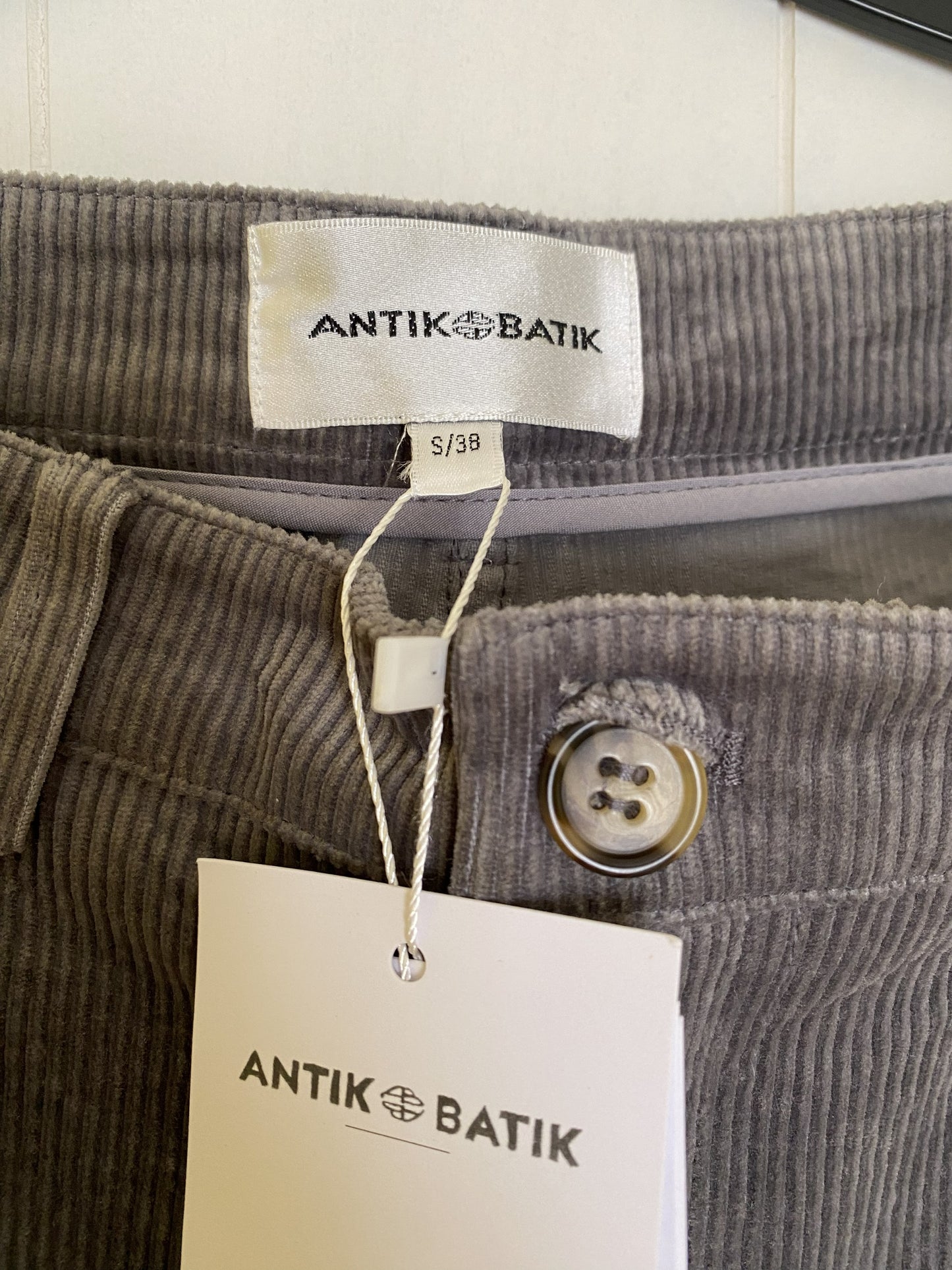 Grey flared trousers