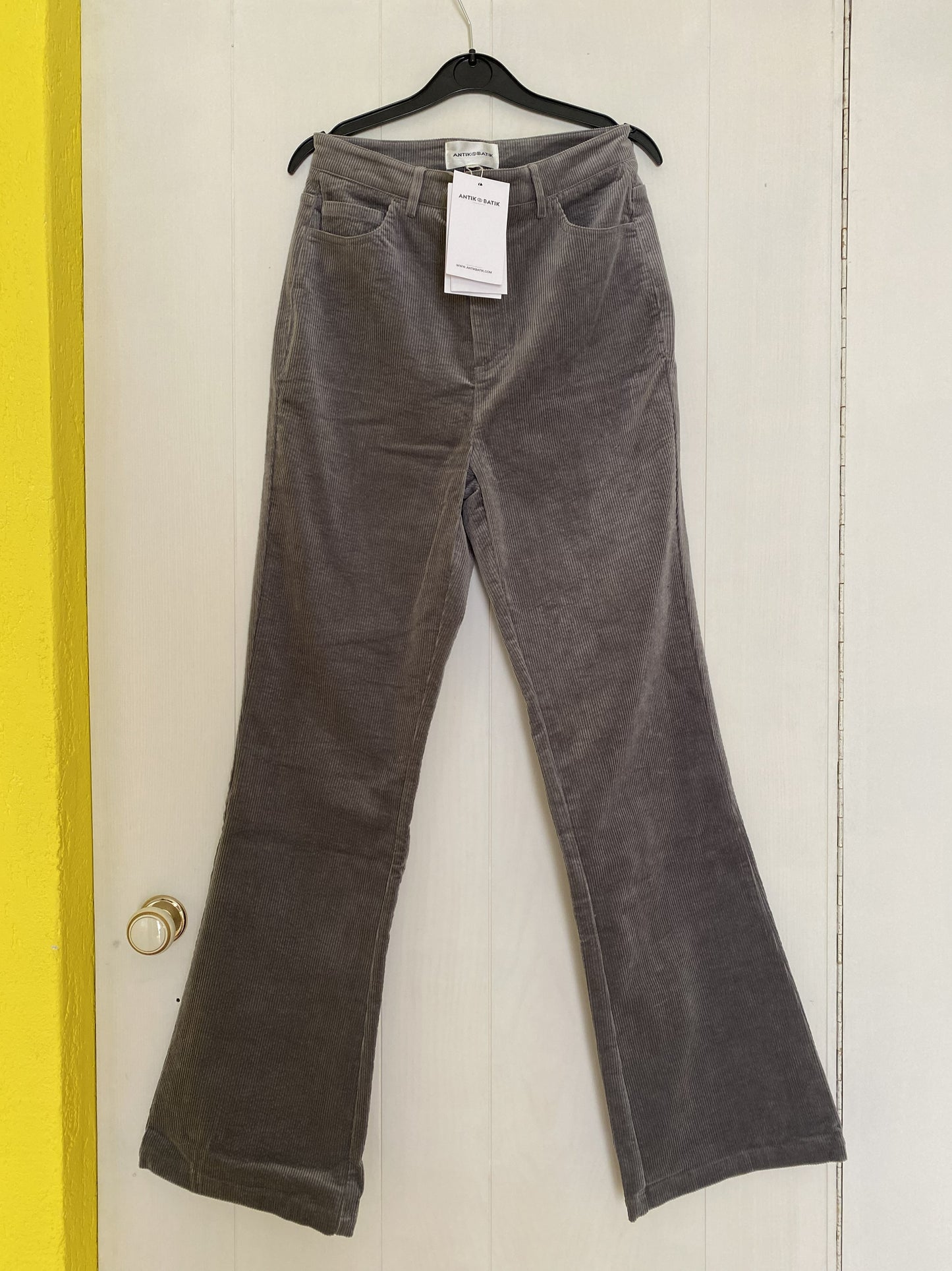 Grey flared trousers