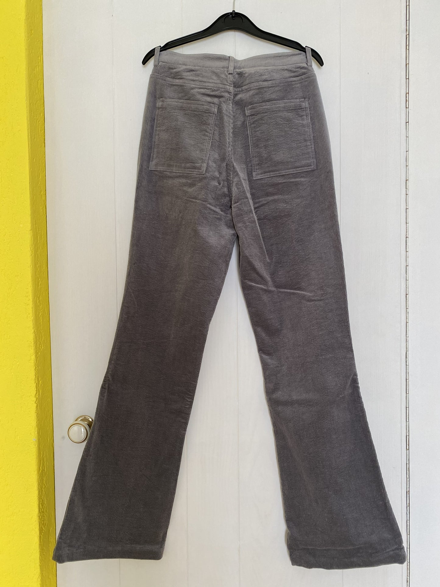 Grey flared trousers