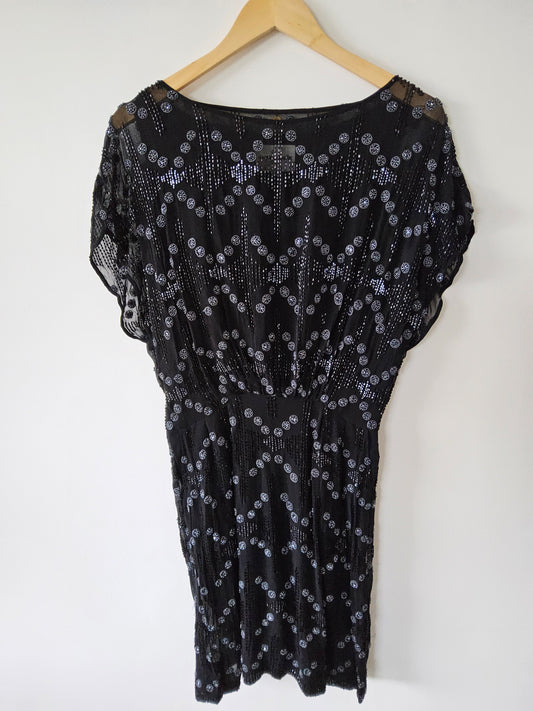 Robe mi-longue brodée de perles Balty