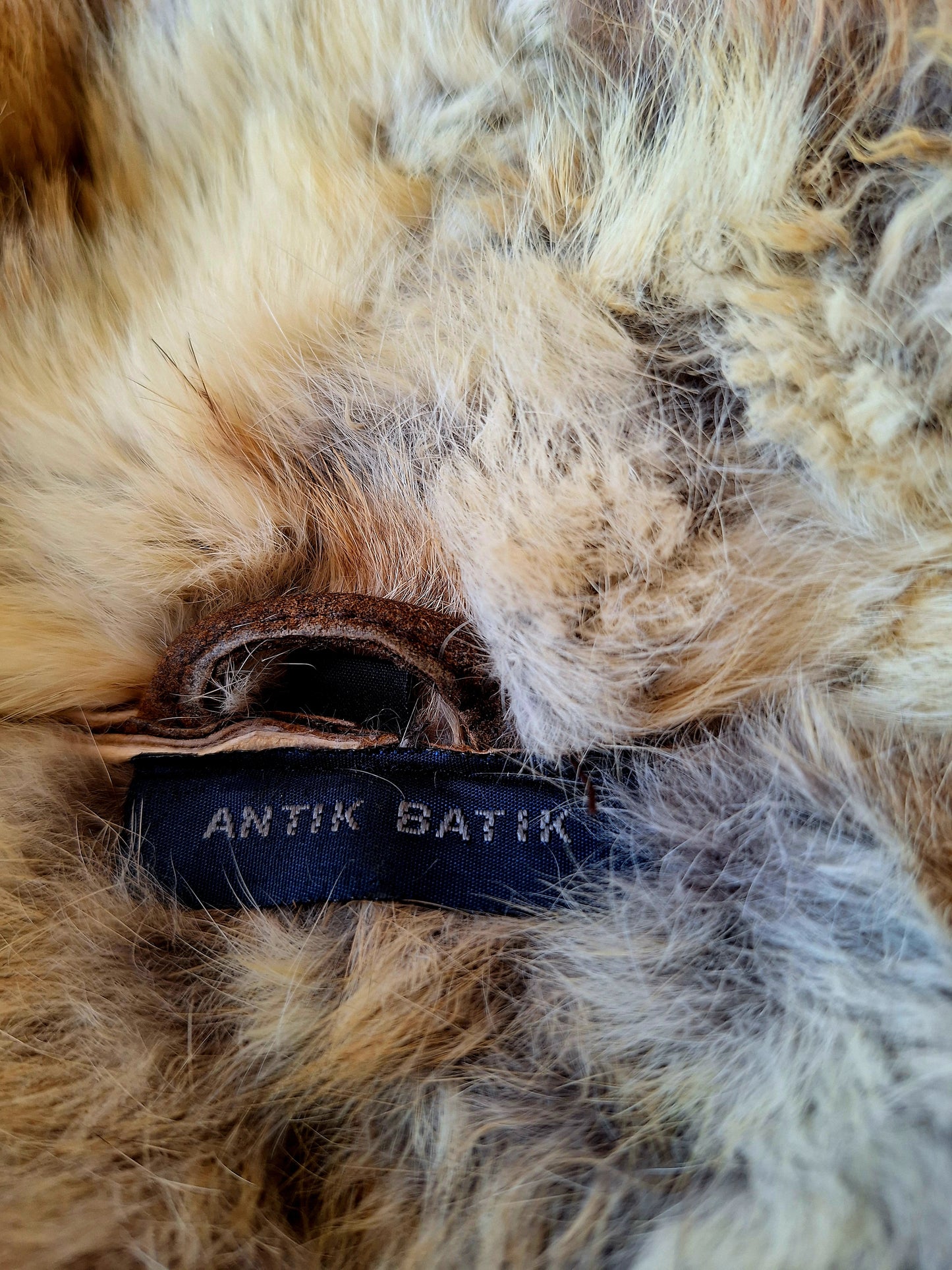 Veste en cuir doublée de fourrure de lapin