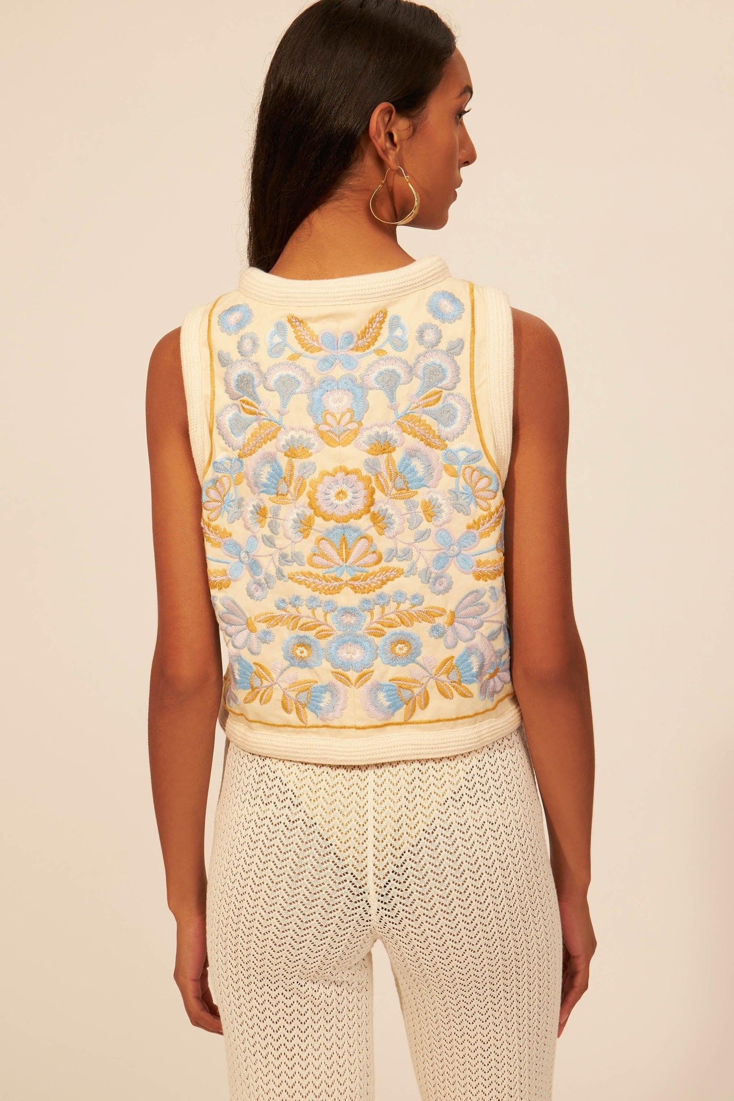 Handy embroidered vest
