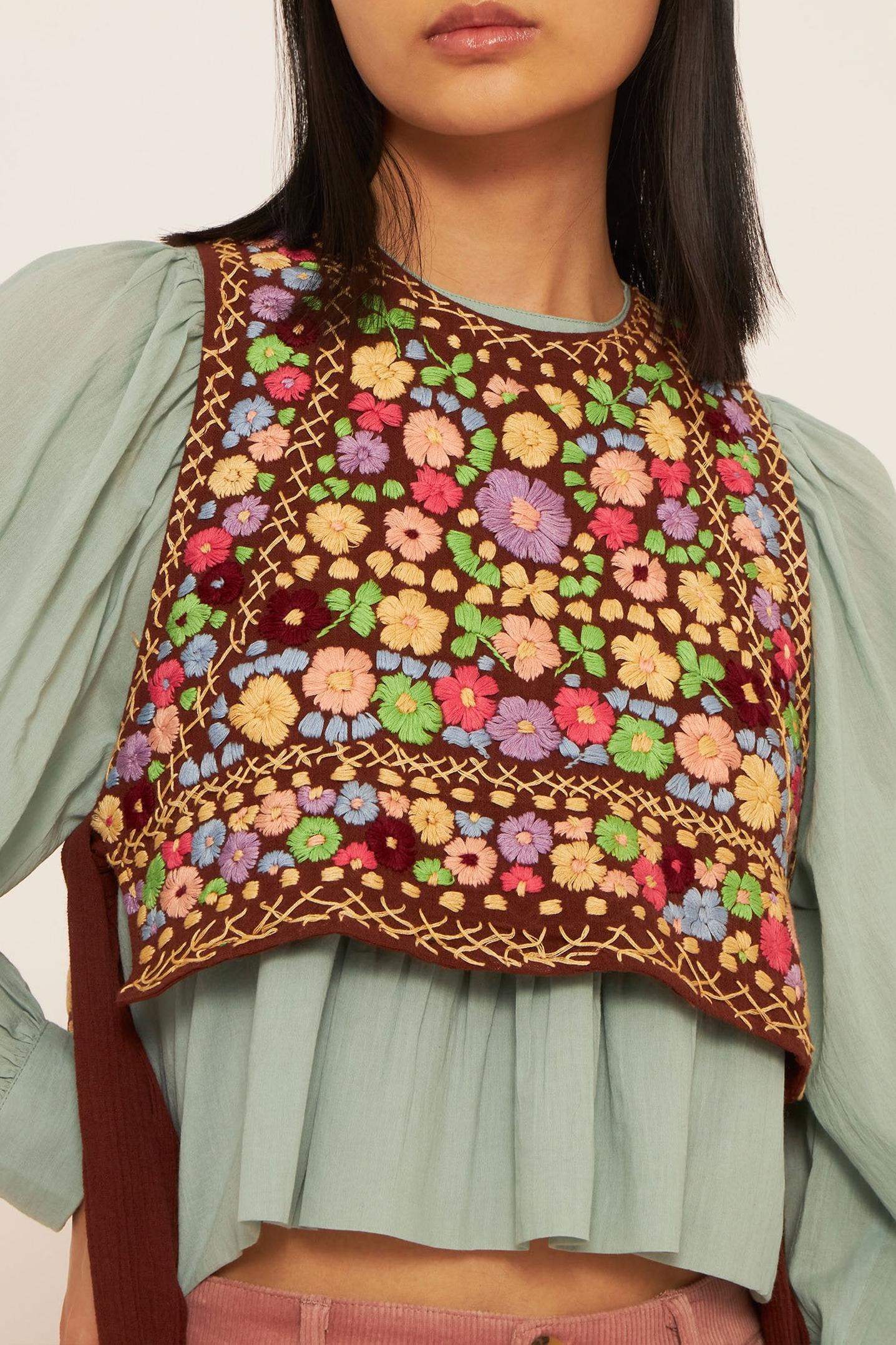 Line embroidered bib front top
