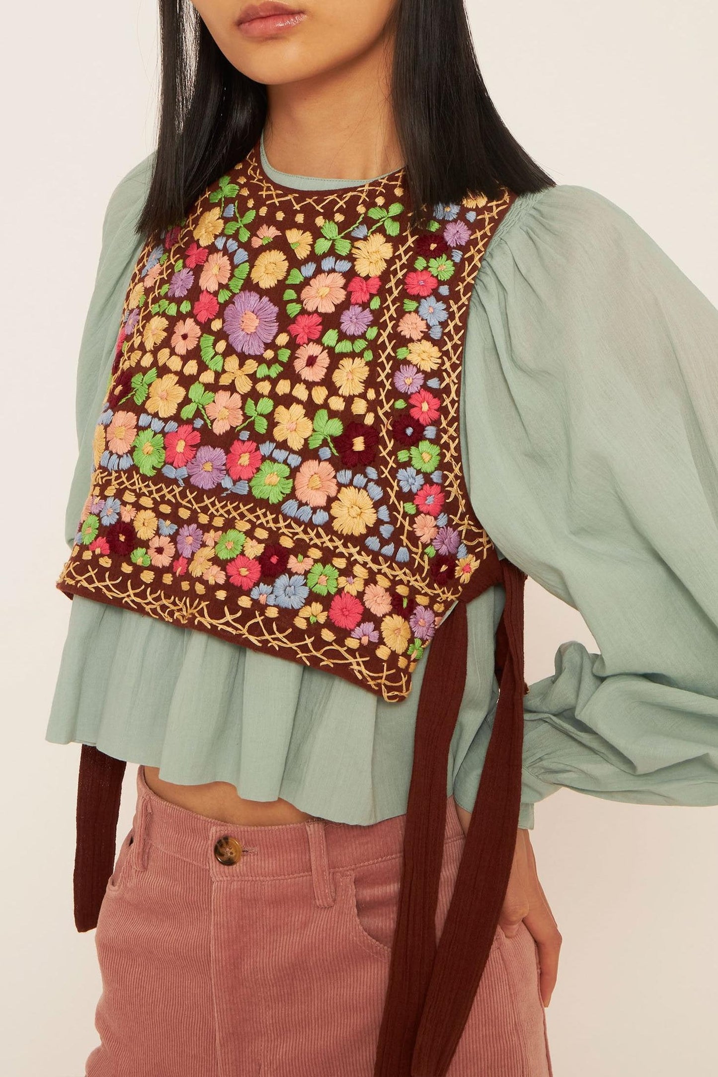 Line embroidered bib front top