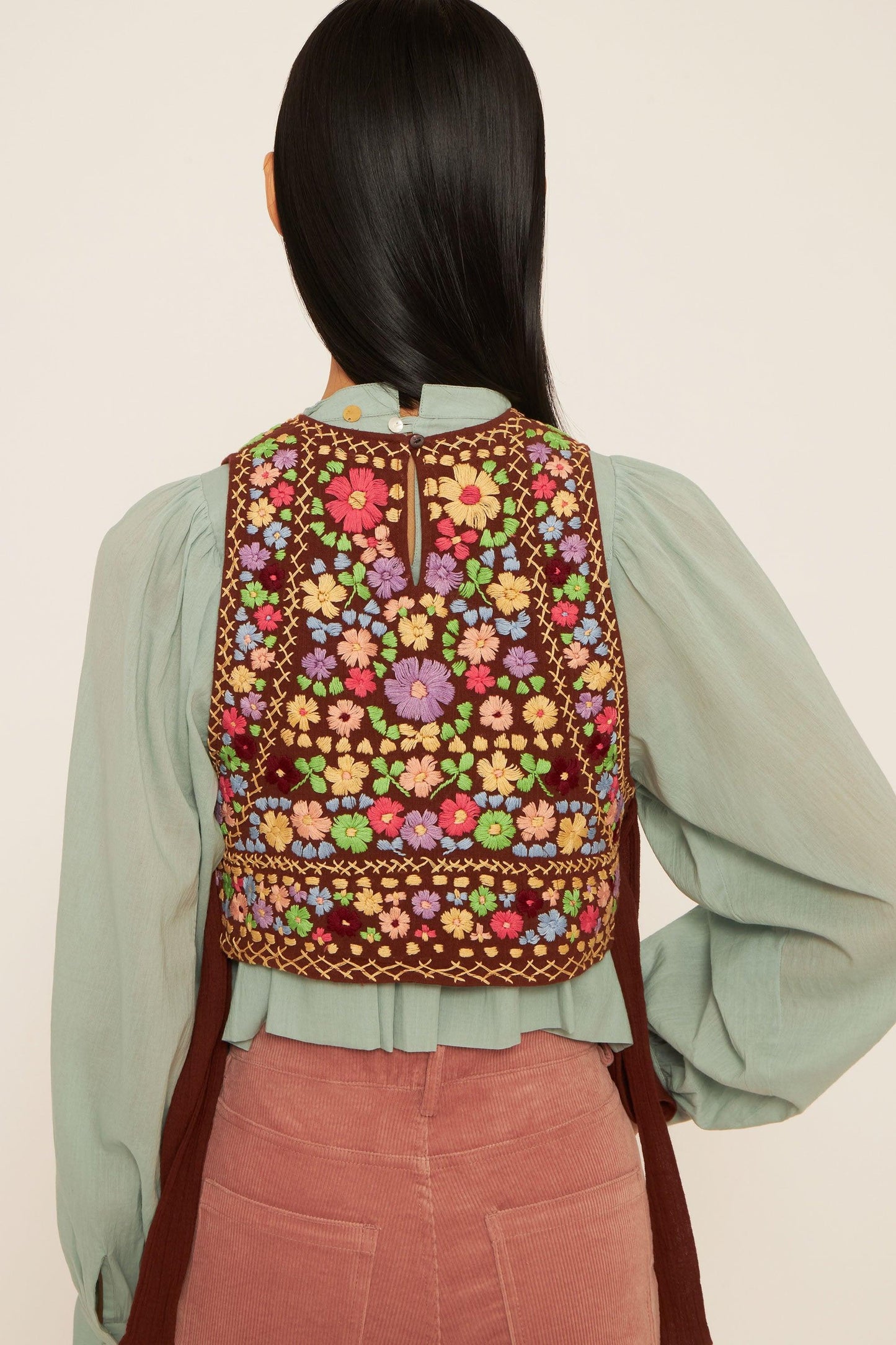 Line embroidered bib front top