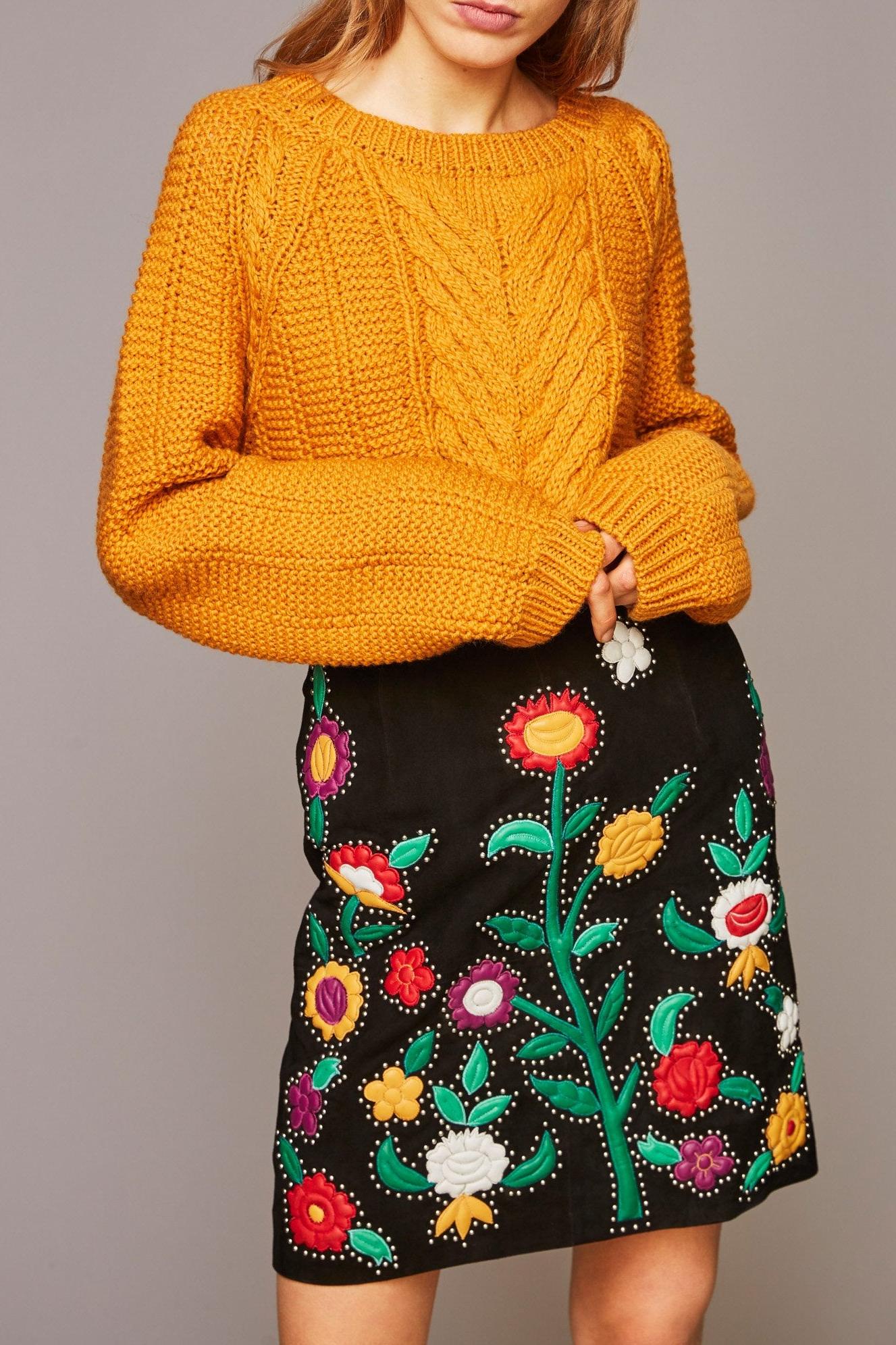 Mini-jupe en cuir suédé fleurie Karo