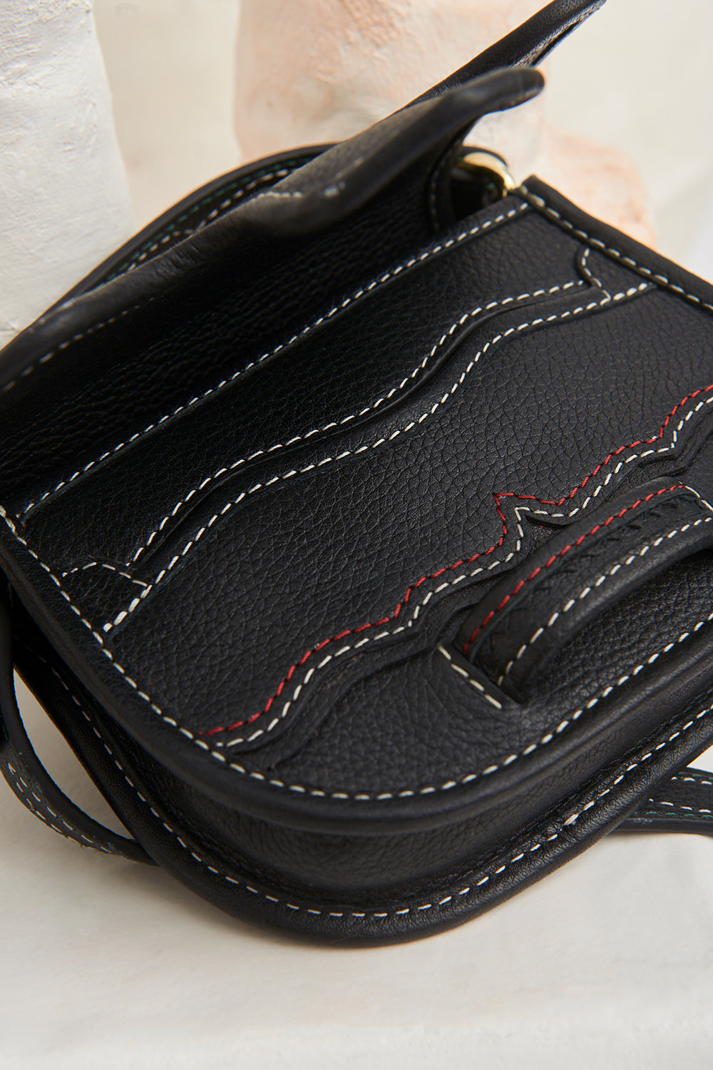 Mini-sac bandoulière en cuir Tyria