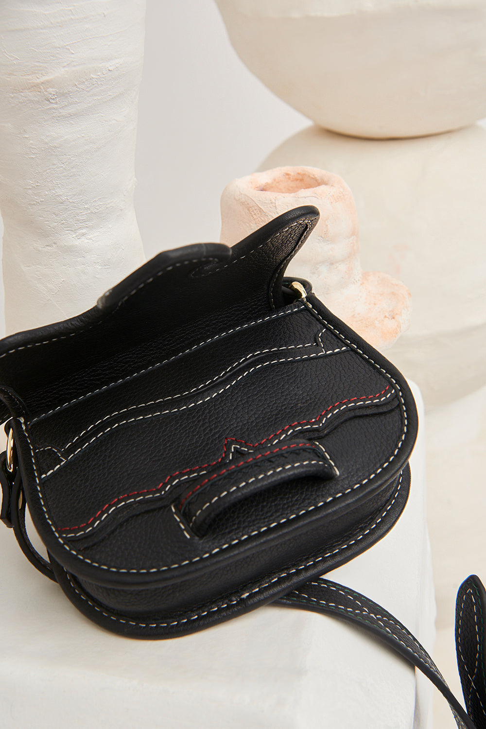 Mini-sac bandoulière en cuir Tyria